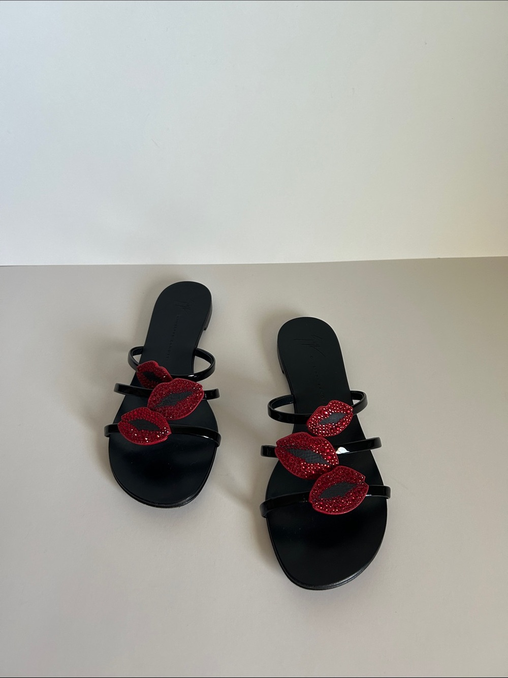 Giuseppe Zanotti Black Slide Sandals with Red Lip Accents